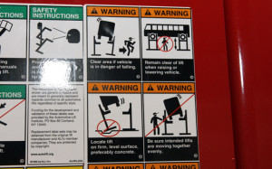 Safety sign for car lift