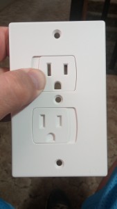 Self closing outlet covers